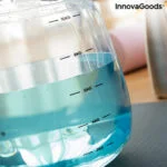 Zvonast utežni balon za polnjenje z vodo za fitnes trening in z vodnikom za vadbo Fibell InnovaGoods