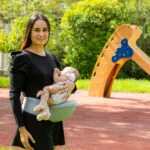 Bočni nosilec za dojenčka z žepi Seccaby InnovaGoods