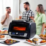 Cvrtnik na vroči zrak z žarom, dodatki in knjigo receptov InnovaGoods Air Fryer Fryinn 12-in-1 6000 Črna Jeklo 6 L 3400 W