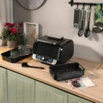 Cvrtnik na vroči zrak z žarom, dodatki in knjigo receptov InnovaGoods Air Fryer Fryinn 12-in-1 6000 Črna Jeklo 6 L 3400 W